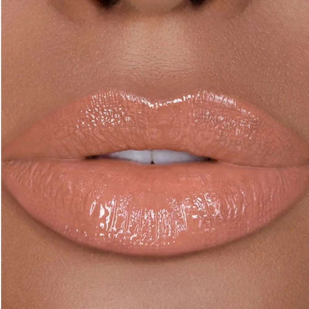 💋HOURGLASS UNREAL™ HIGH SHINE VOLUMIZING LIP GLOSS - SUBLIME
